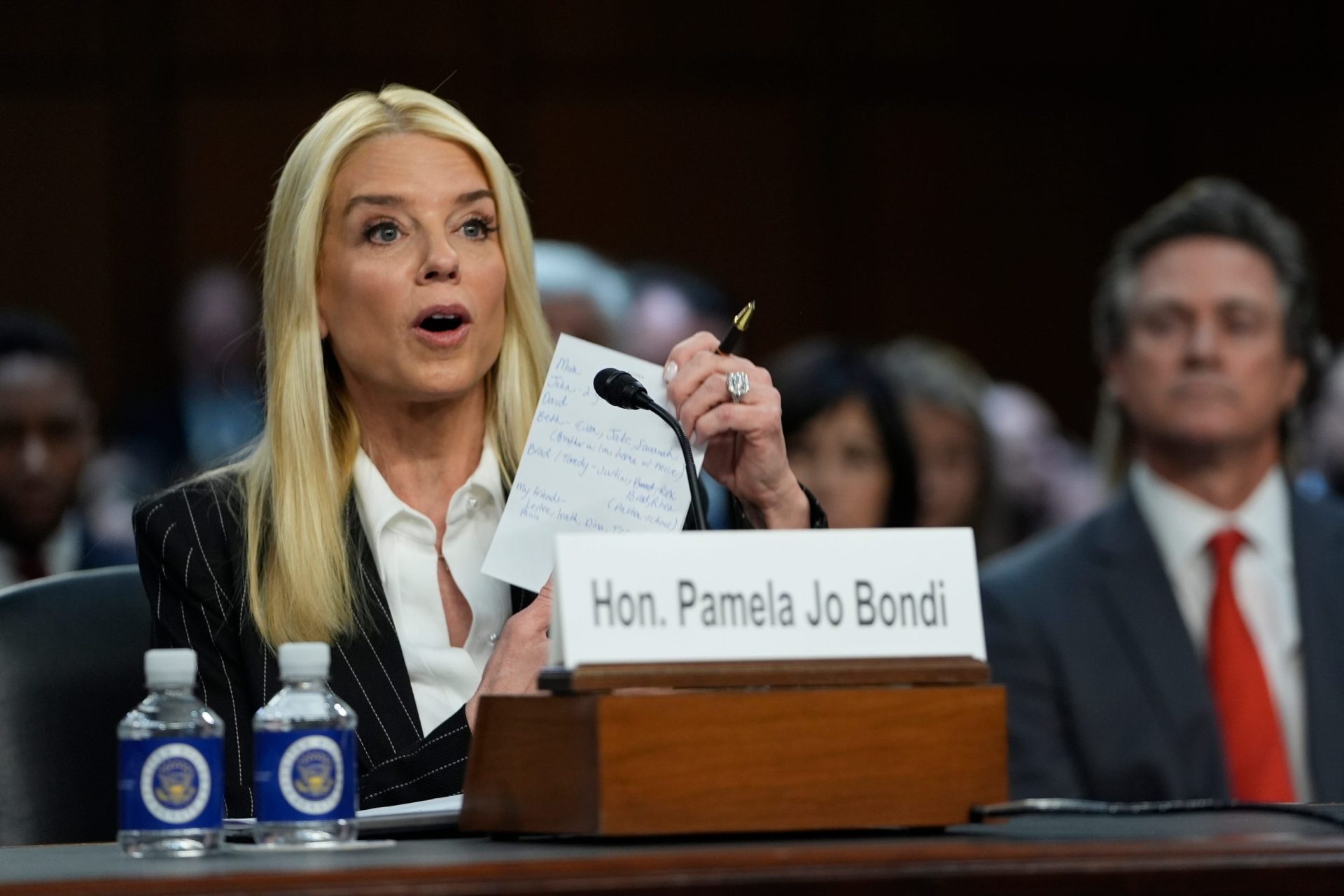 Pam Bondi recognizes family and friends in attendance as she delivers opening remarks during a Senate Judiciary committee hearing on her nomination to be Attorney General of the United States on Jan. 15, 2025 in Washington, D.C.