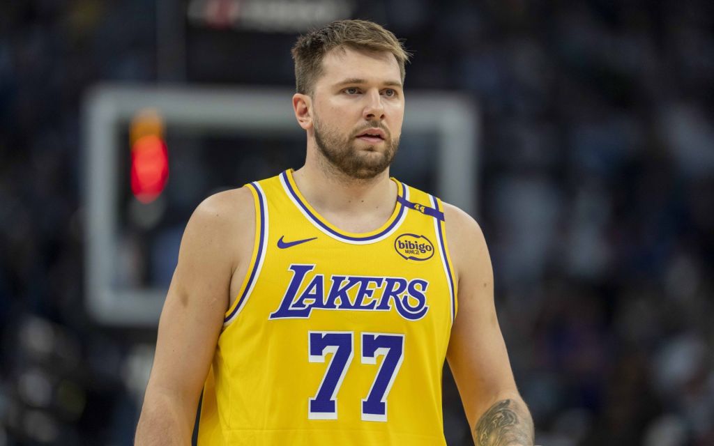 Apr 25, 2025; Minneapolis, Minnesota, USA; Los Angeles Lakers guard Luka Doncic (77) looks on against the Minnesota Timberwolves in the first half during game three of first round for the 2024 NBA Playoffs at Target Center.