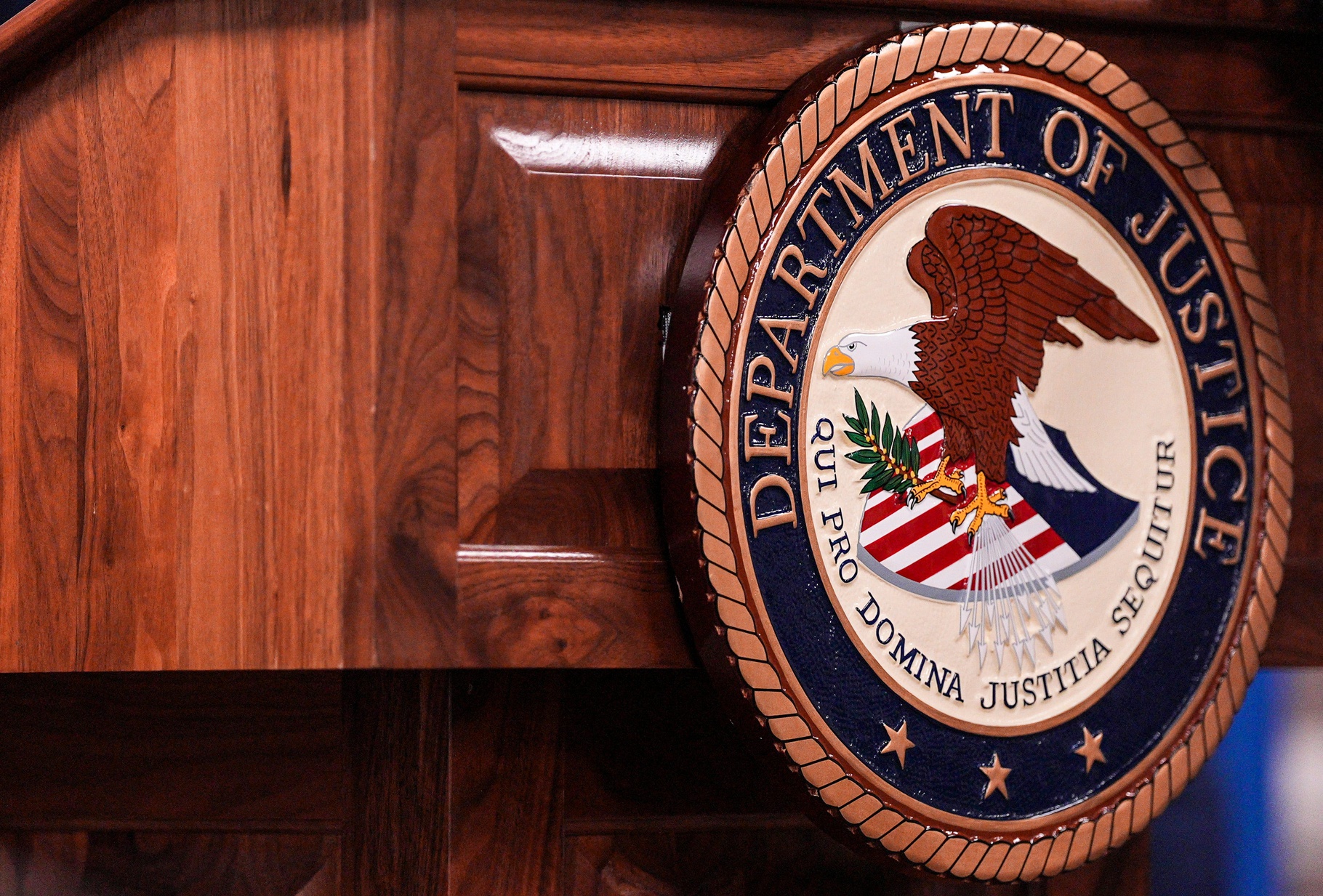 The Department of Justice logo on a podium at the Louisville, Kentucky office. July 1, 2025