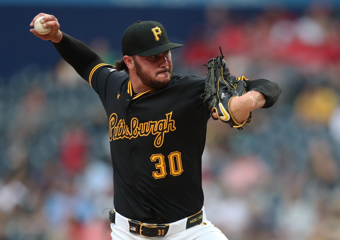 Jul 1, 2025; Pittsburgh, Pennsylvania, USA; Pittsburgh Pirates starting pitcher Paul Skenes (30) pitches against the St. Louis Cardinals during the third inning at PNC Park.