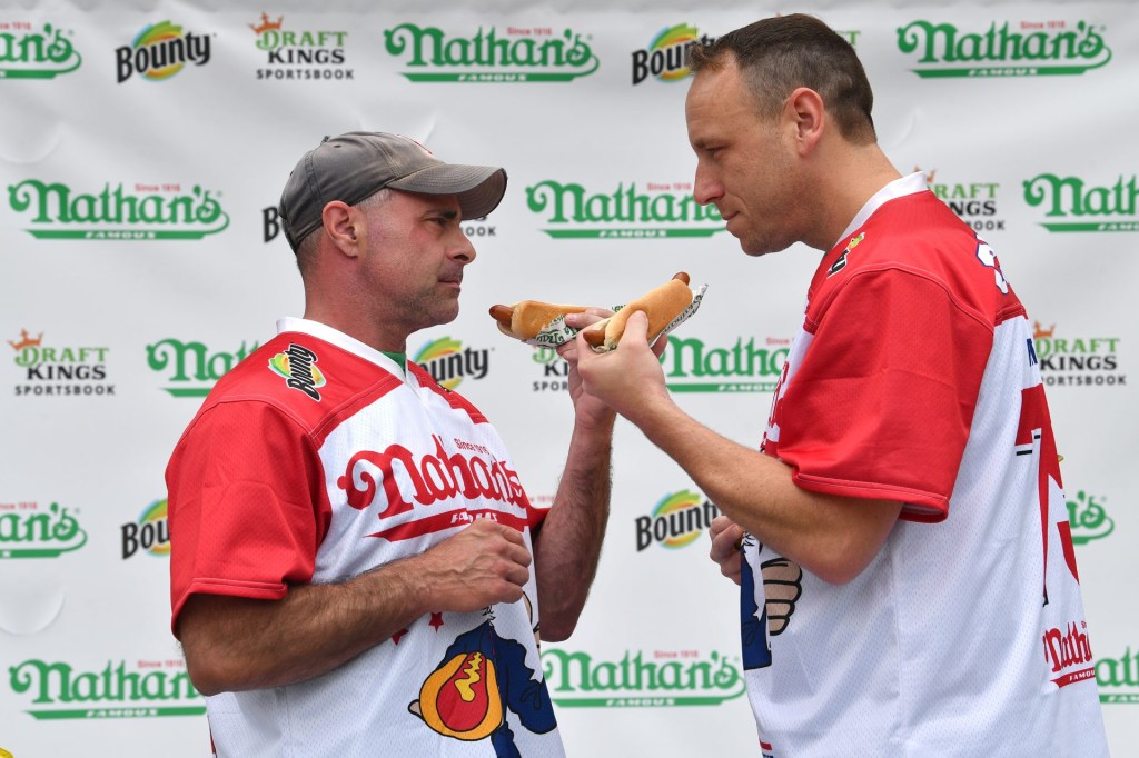 Nathan’s Weigh In.
Friday, July 2, 2021
The official Weigh In ceremony for Nathan’s Famous Fourth of July International Hot Dog Eating Championship was held at the Hudson Yards Plaza in Manhattan at 11AM.
The competitors included the defending men’s champion Joey “JAWS” Chestnut and women’s competition odds-on favorite Michele Lesco.
Last Year women’s champion Miki Sudo who is 8th month pregnant was on hand to support her boyfriend Nick Wehry who will compete in the men’s competition.
The event will be hosted on Sunday July 4th at MaimonidesPark in Coney Island Brooklyn in front of live audience after last year pause due to COVID-19.
For weigh-in stats; 
Men’s Joey Chestnut 242 lb, Geoffrey Esper 187 lb, 
Women’s Michele Lesco 112 1/2 lb, Sarah Rodriguez 143 lb.