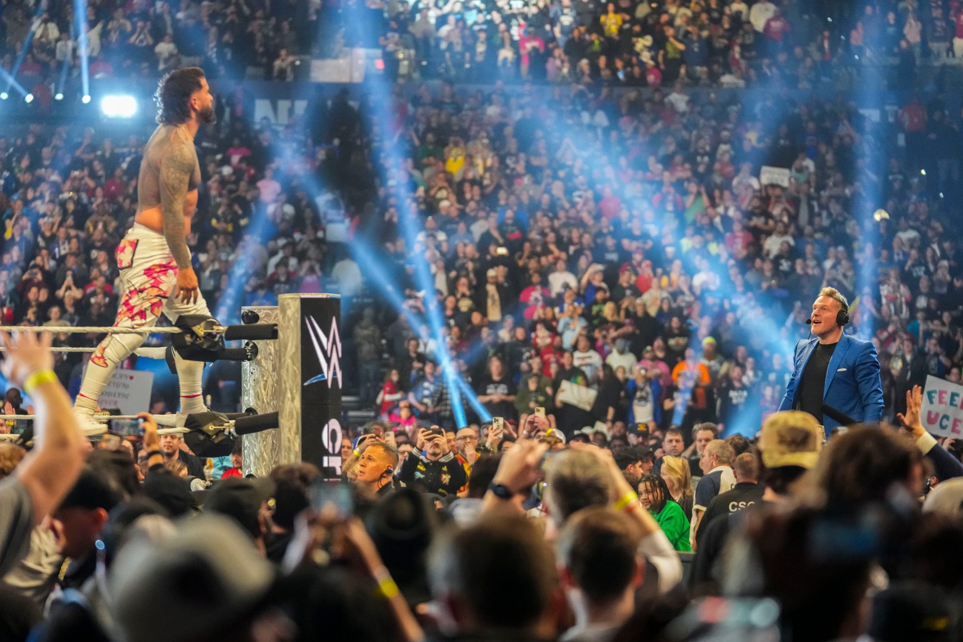 Jey Uso and Pat McAfee look at each other after Uso’s win Saturday, Feb. 1, 2025, during the WWE Royal Rumble at Lucas Oil Stadium in Indianapolis.