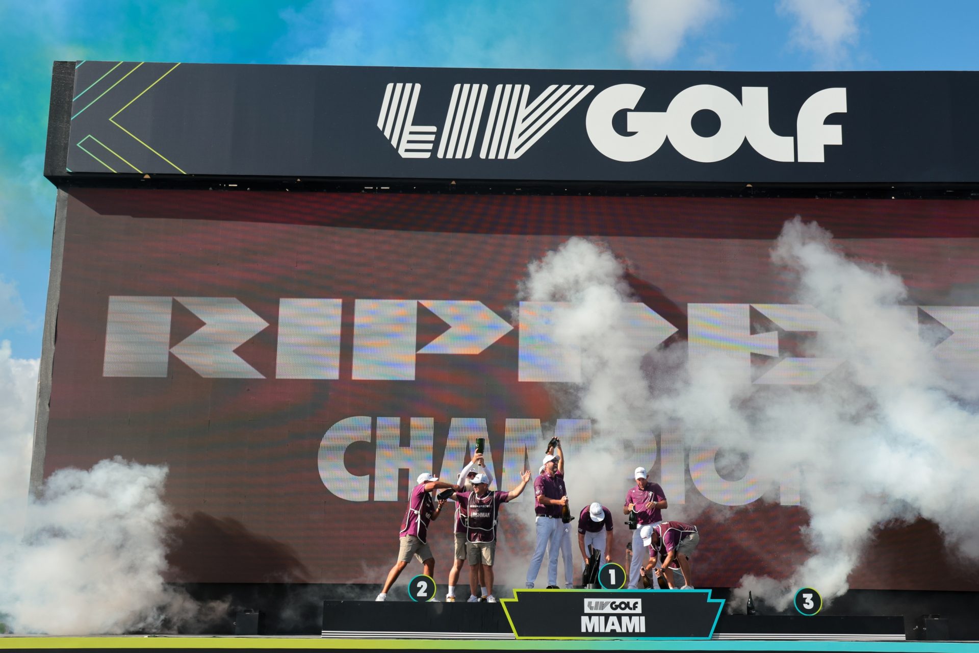 Apr 6, 2025; Miami, Florida, USA; Marc Leishman (center) celebrates with his teammates after winning the final round of the LIV Golf Miami golf tournament at Trump National Doral.