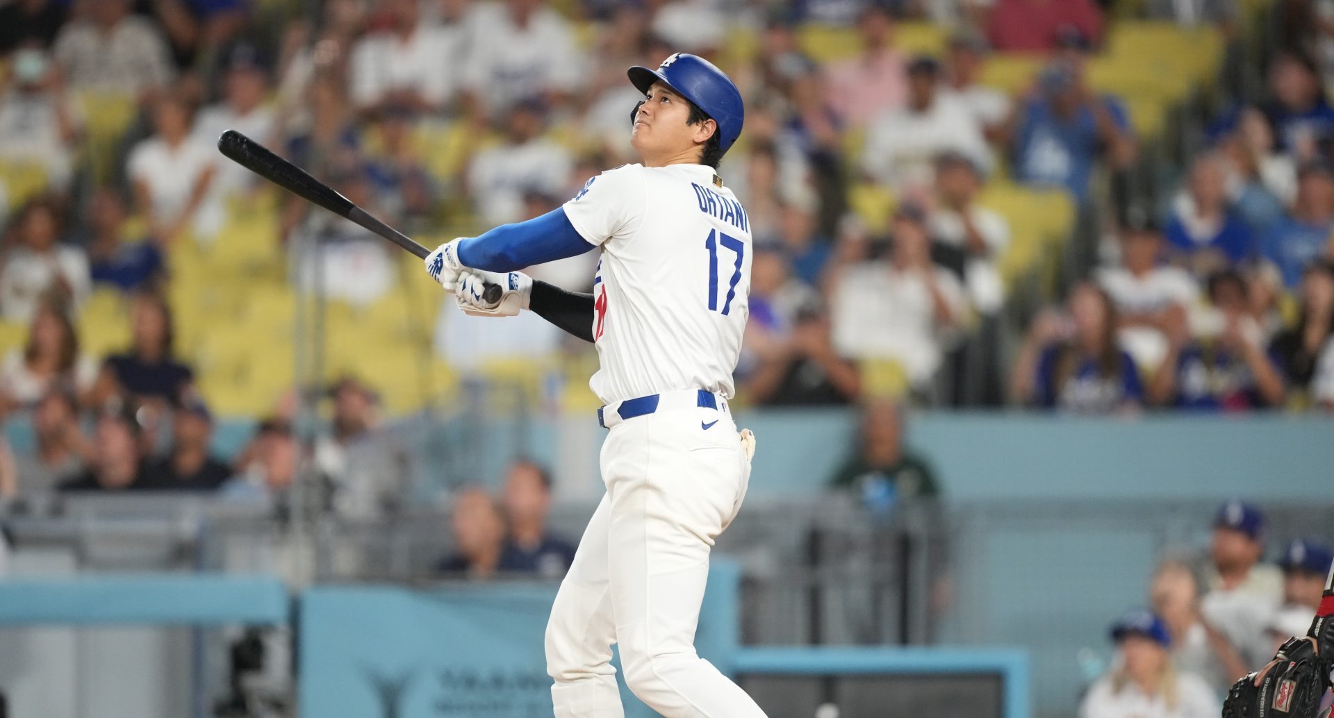 Aug 27, 2025; Los Angeles, California, USA; Los Angeles Dodgers starting pitcher Shohei Ohtani (17) flies out to left field in the eighth inning against the Cincinnati Reds at Dodger Stadium.
