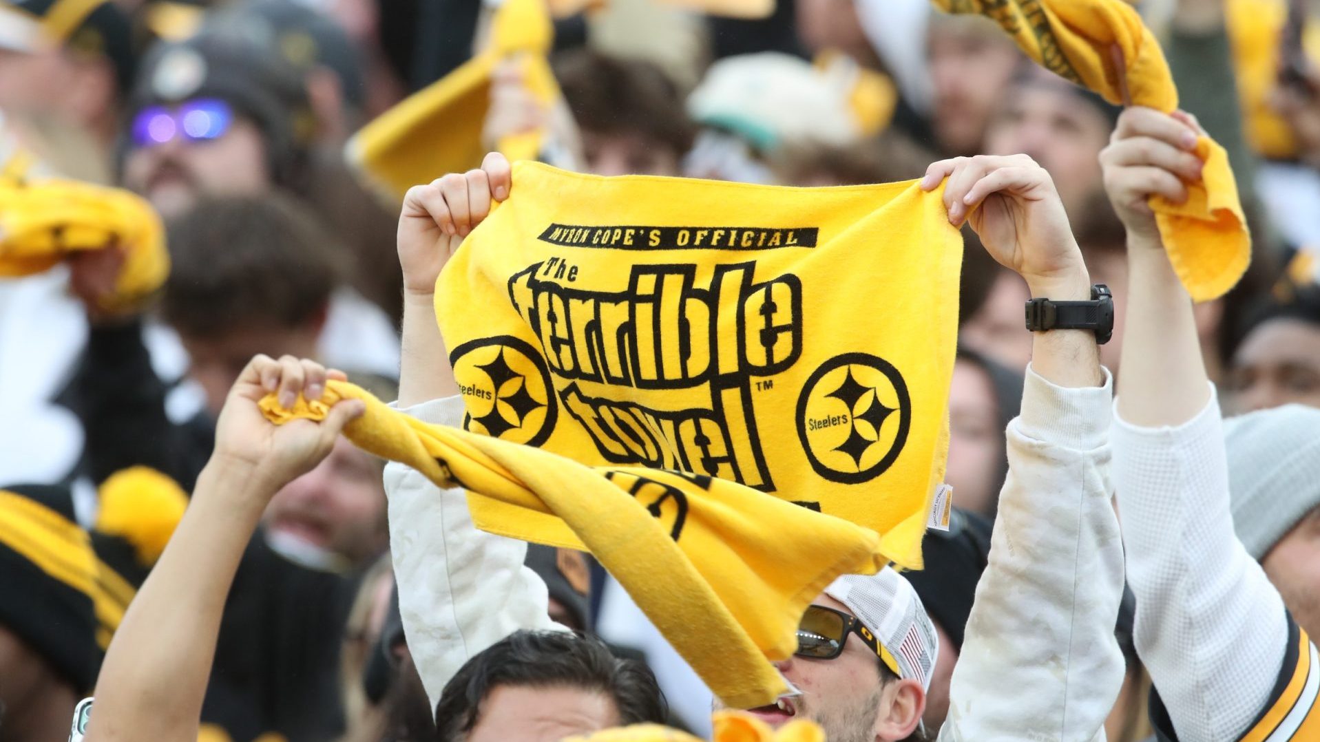 Nov 17, 2024; Pittsburgh, Pennsylvania, USA; Pittsburgh Steelers fans wave Terrible Towels against the Baltimore Ravens during the fourth quarter at Acrisure Stadium