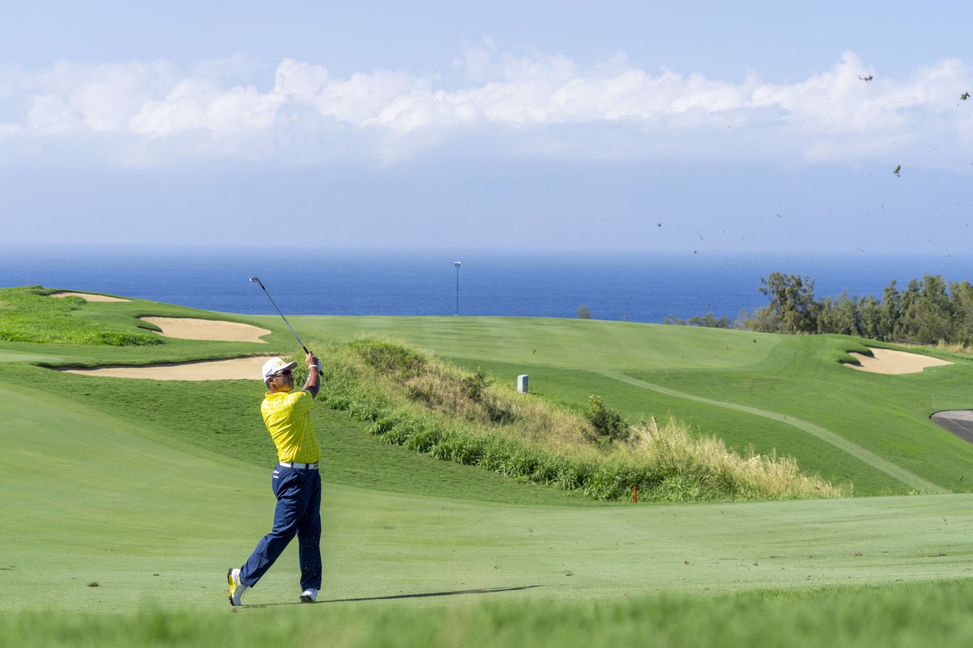January 5, 2025; Maui, Hawaii, USA; Hideki Matsuyama hits his fairway shot on the 13th hole during the final round of The Sentry golf tournament at Plantation Course at Kapalua.