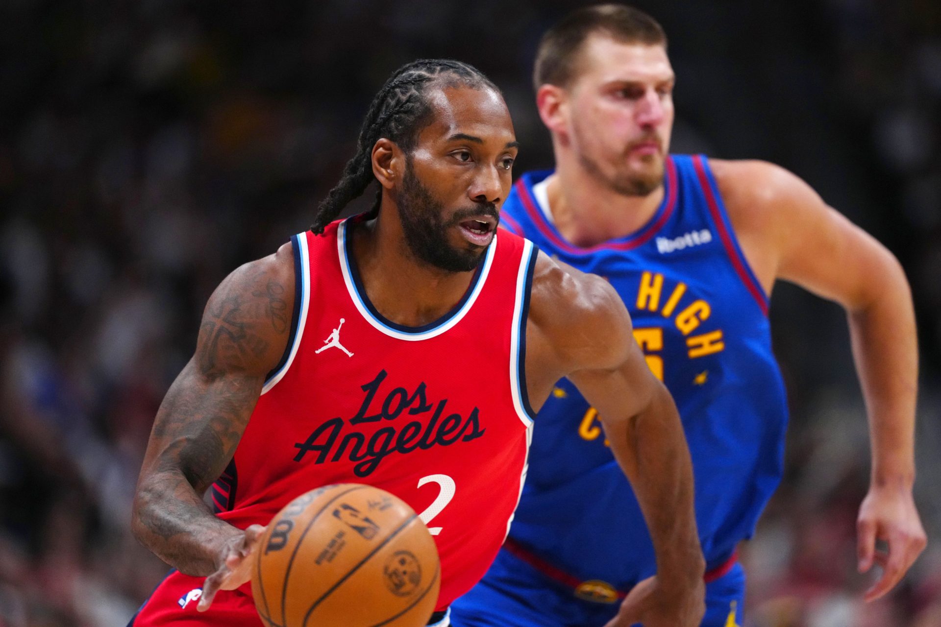 May 3, 2025; Denver, Colorado, USA; LA Clippers forward Kawhi Leonard (2) controls the ball in the first quarter against the Denver Nuggets during game seven of first round for the 2025 NBA Playoffs at Ball Arena.