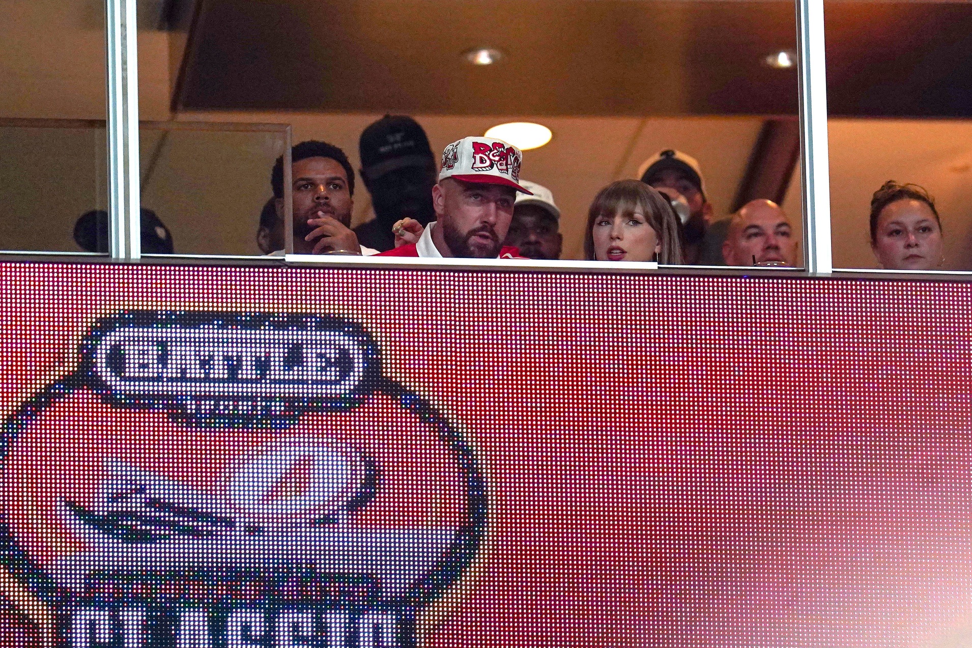 Kansas City Chiefs tight end Travis Kelce, left, and singer-songwriter Taylor Swift appear at the Kansas City Classic season opening game between the Cincinnati Bearcats and Nebraska Cornhuskers, Aug. 28, 2025, at Arrowhead Stadium in Kansas City, Mo. This is the first time the couple have appeared in the public since their engagement.