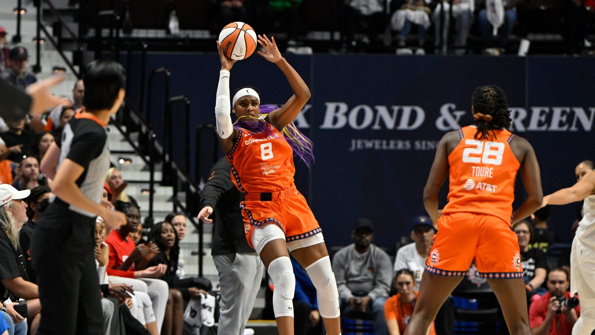 Sep 10, 2025; Uncasville, Connecticut, USA; Connecticut Sun forward Aaliyah Edwards (8) fights to keep the ball in-bounds during the second half against the Atlanta Dream at Mohegan Sun Arena.