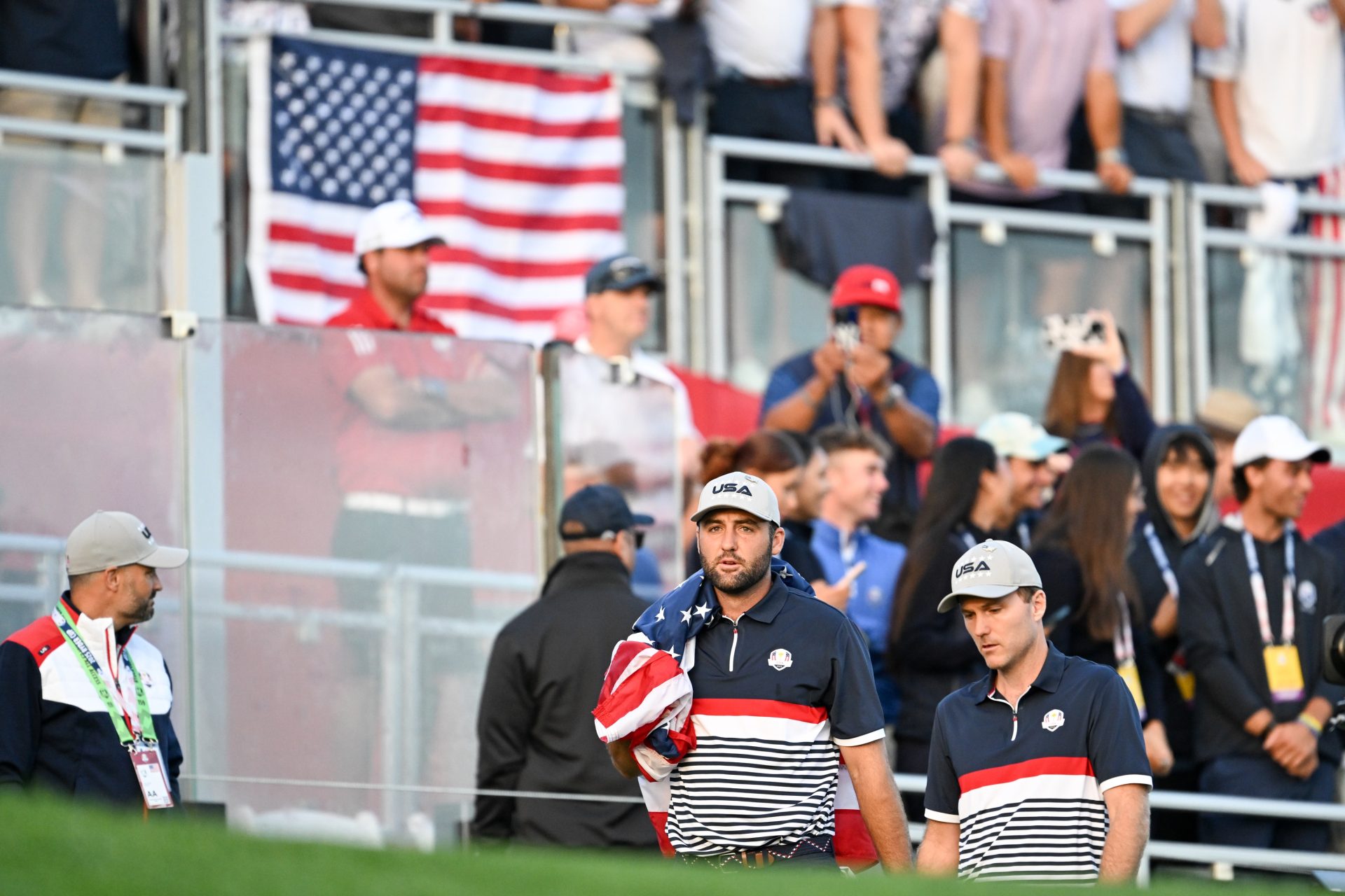 Sep 26, 2025; Bethpage, New York, USA; Team USA golfers Scottie Scheffler and Russell Henley walk out to the first tee on the first day of competition for the Ryder Cup at Bethpage Black.