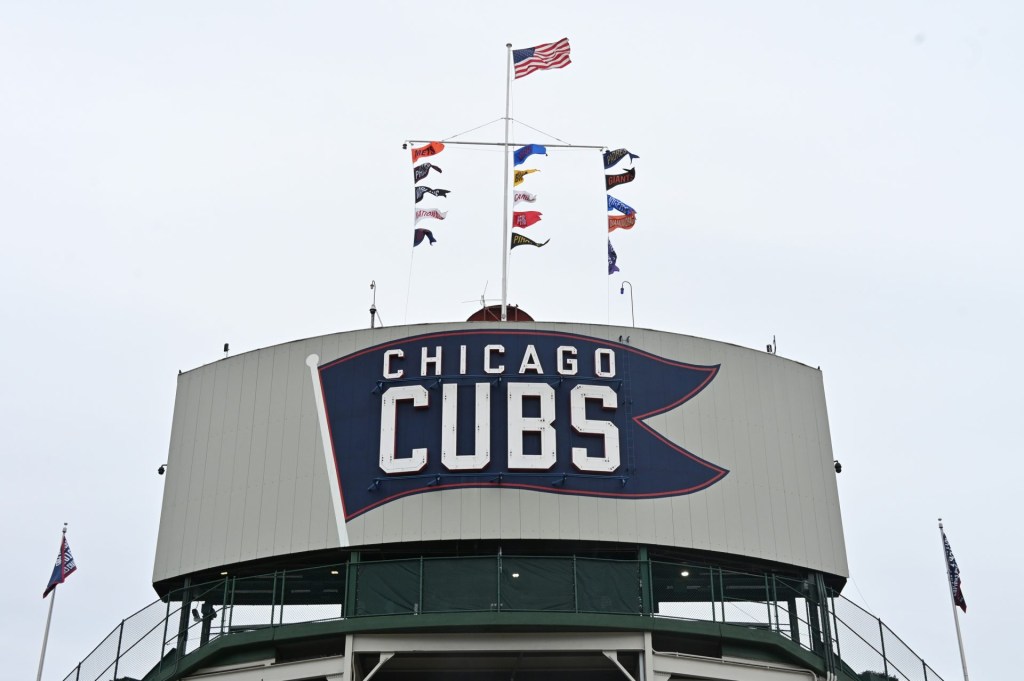 Apr 9, 2025; Chicago, Illinois, USA; The Chicago Cubs flag sign is seen prior to a game between the Texas Rangers and Chicago Cubs at Wrigley Field