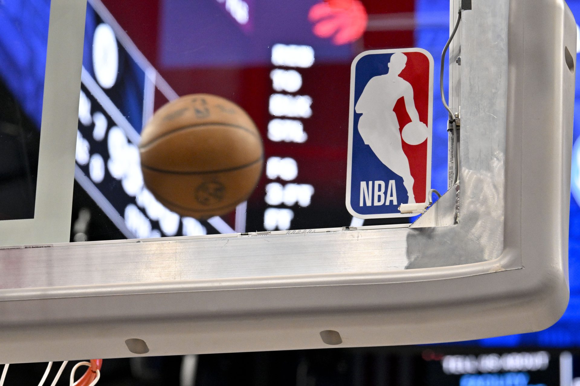 Apr 11, 2025; Dallas, Texas, USA; A view of an NBA basketball and backyard and NBA logo before the game between the Dallas Mavericks and the Toronto Raptors at the American Airlines Center.