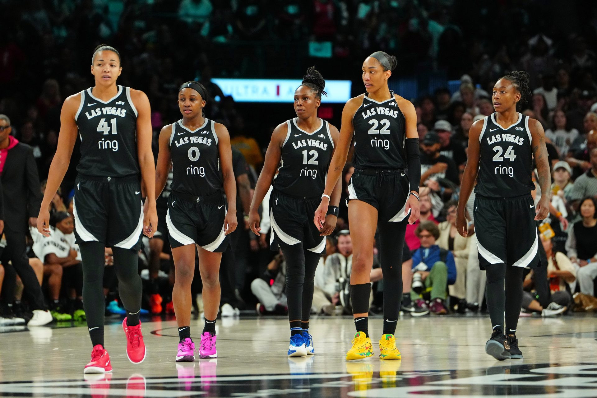 Sep 30, 2025; Las Vegas, Nevada, USA; Las Vegas Aces center Kiah Stokes (41), Las Vegas Aces guard Jackie Young (0), Las Vegas Aces guard Chelsea Gray (12), Las Vegas Aces center A'ja Wilson (22), and Las Vegas Aces guard Jewell Loyd (24) take the court after an Indiana Fever time out in the fourth quarter of game five of the second round for the 2025 WNBA Playoffs at Michelob Ultra Arena.