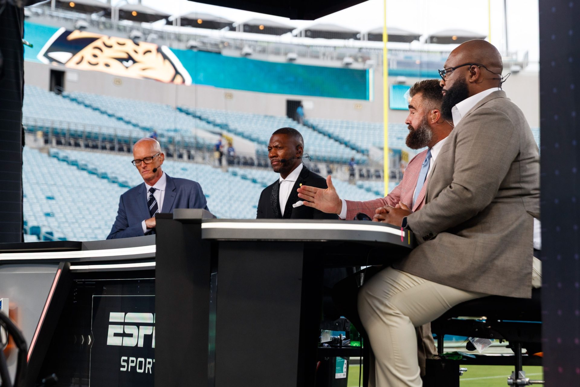 Oct 6, 2025; Jacksonville, Florida, USA; ESPN broadcasters Scott Van Pelt, Ryan Clark, Jason Kelce and Marcus Spears before the game between the Kansas City Chiefs and the Jacksonville Jaguars at EverBank Stadium.