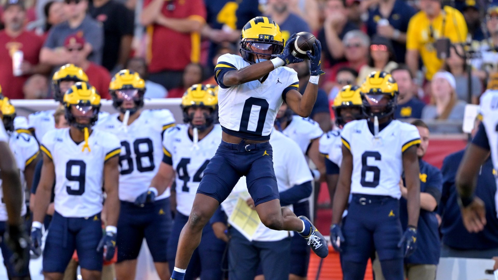Oct 11, 2025; Los Angeles, California, USA; Michigan Wolverines wide receiver Semaj Morgan (0) makes a catch for a first down in the first half against the USC Trojans at United Airlines Field at the Los Angeles Memorial Coliseum.