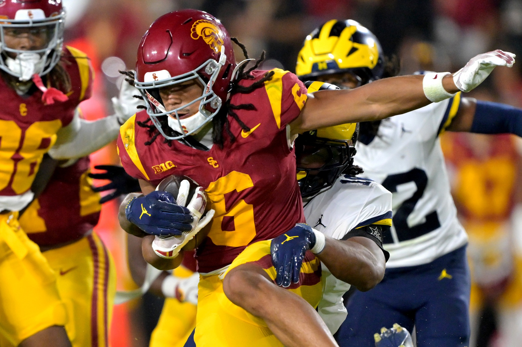 Oct 11, 2025; Los Angeles, California, USA; USC Trojans wide receiver Makai Lemon (6) takes the ball on a kickoff return in the second half against the Michigan Wolverines at United Airlines Field at the Los Angeles Memorial Coliseum