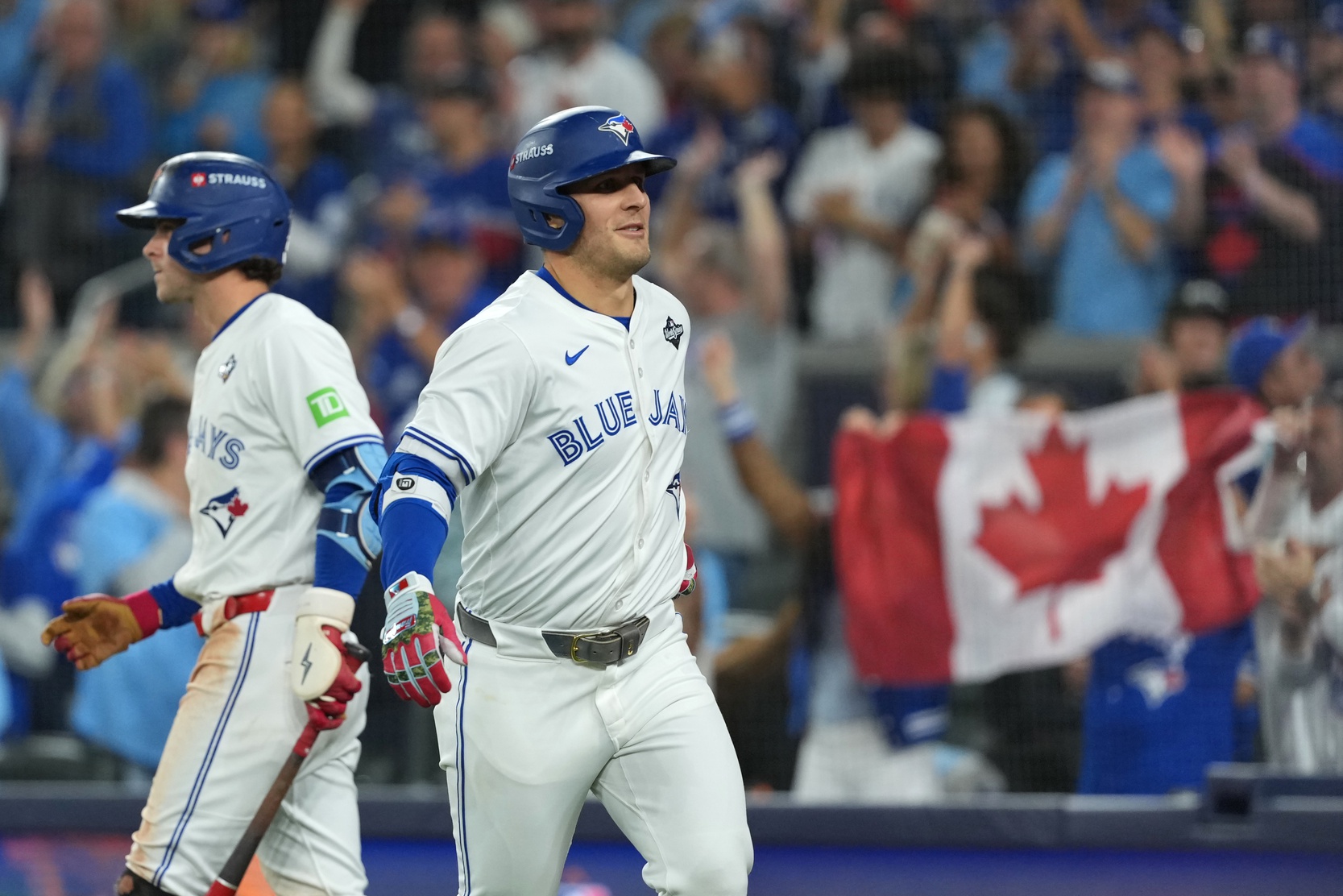 Oct 24, 2025; Toronto, Ontario, CAN; Toronto Blue Jays center fielder Daulton Varsho (5) celebrates after hitting a two run home run against the Los Angeles Dodgers in the fourth inning during game one of the 2025 MLB World Series at Rogers Centre.