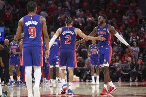Oct 24, 2025; Houston, Texas, USA; Detroit Pistons forward Paul Reed (7) celebrates with guard Cade Cunningham (2) after a play during the fourth quarter against the Houston Rockets at Toyota Center.