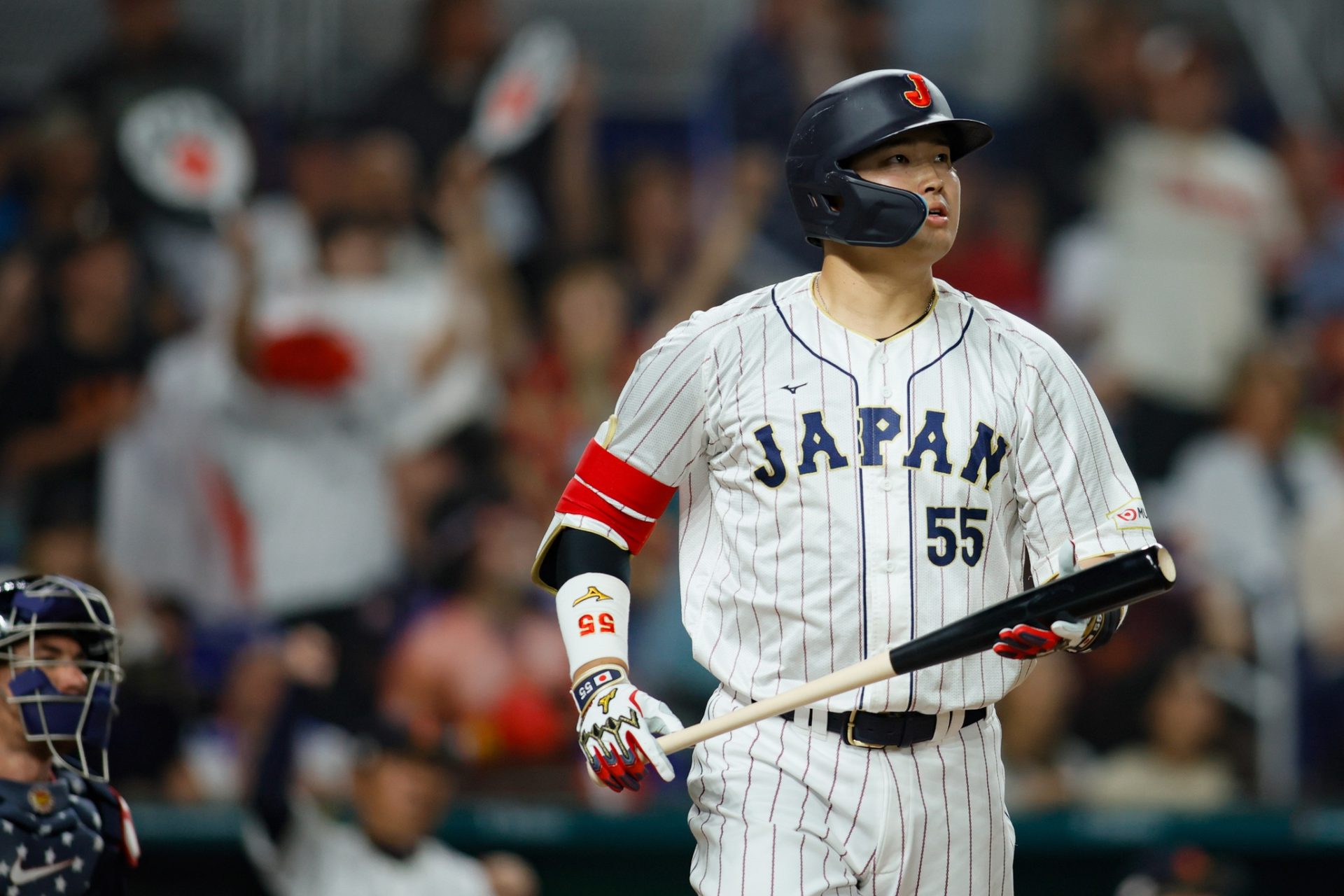 Mar 21, 2023; Miami, Florida, USA; Japan third baseman Munetaka Murakami (55) looks on after hitting a home run during the second inning against USA at LoanDepot Park.