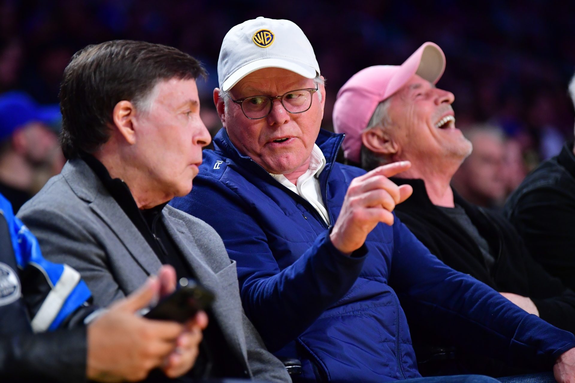 Mar 6, 2025; Los Angeles, California, USA; Network executive David Zaslav and Bob Costas attend the game between the Los Angeles Lakers and New York Knicks during the first half at Crypto.com Arena.