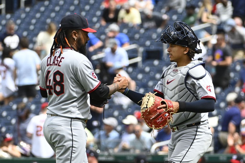 May 7, 2025; Washington, District of Columbia, USA; Cleveland Guardians relief pitcher Emmanuel Clase (48) is congratulated by catcher Bo Naylor (23) after earning a save against the Washington Nationals at Nationals Park.