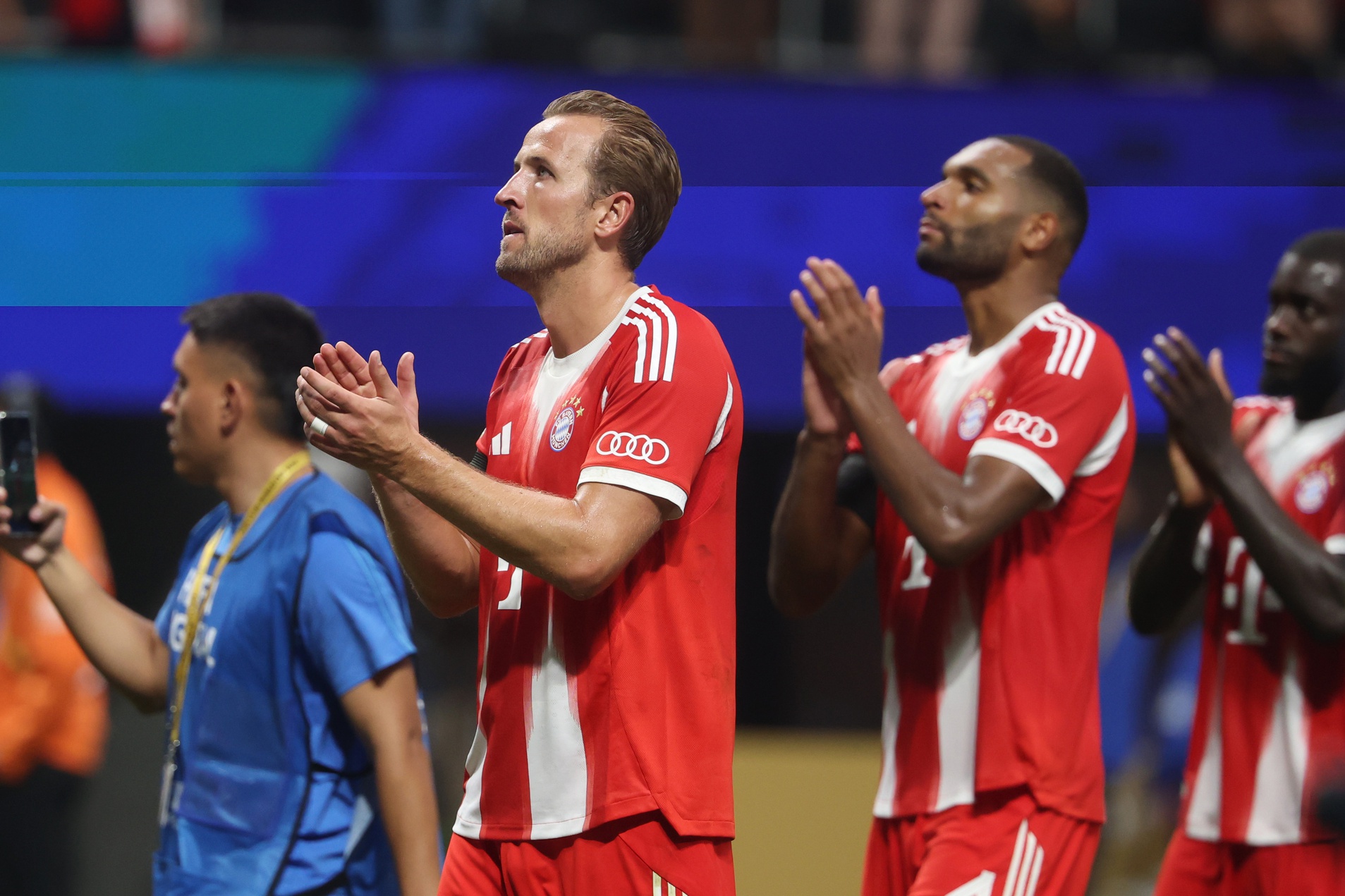 Jul 5, 2025; Atlanta, Georgia, USA; FC Bayern Munich forward Harry Kane (9) and defender Jonathan Tah (4) react a quarterfinal match of the 2025 FIFA Club World Cup against Paris Saint-Germain at Mercedes-Benz Stadium.
