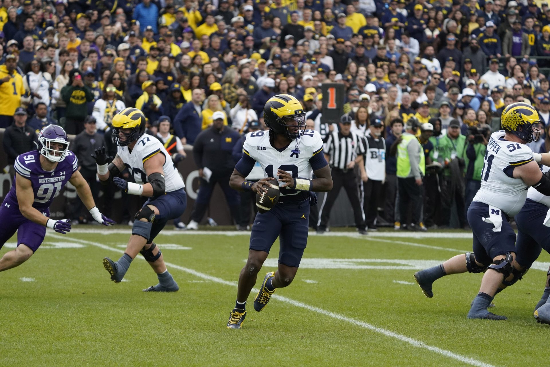 Nov 15, 2025; Chicago, Illinois, USA; Michigan Wolverines quarterback Bryce Underwood (19) throws the ball against the Northwestern Wildcats during the first half at Wrigley Field.