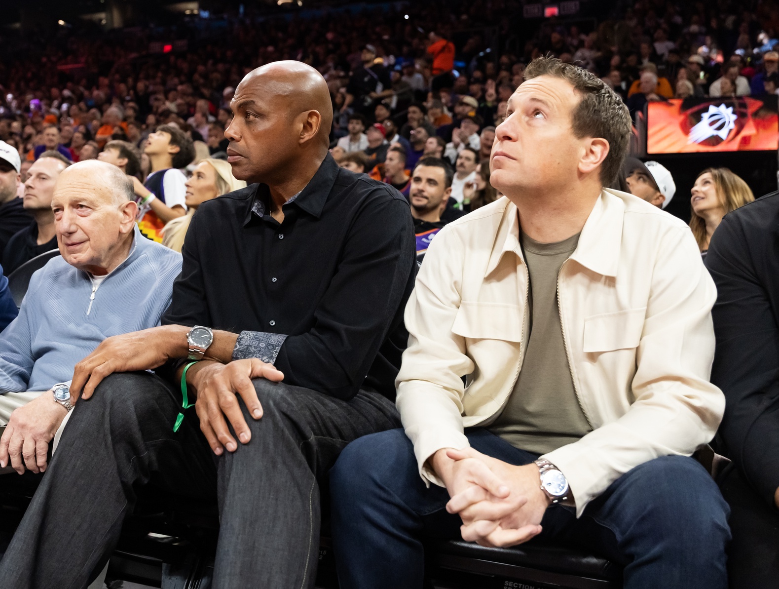 Nov 21, 2025; Phoenix, Arizona, USA; Phoenix Suns former player Charles Barkley (left) and team owner Mat Ishbia sit courtside against the Minnesota Timberwolves during an NBA Cup game at Mortgage Matchup Center.