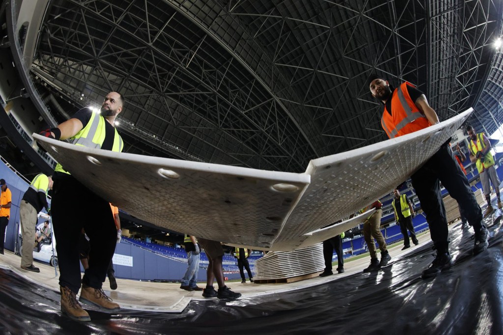 MIAMI, FLORIDA - DECEMBER 17: Construction begins for the 2026 Discover NHL Winter Classic - Rink Build Out at LoanDepot Park on December 17, 2025 in Miami, Florida. 
