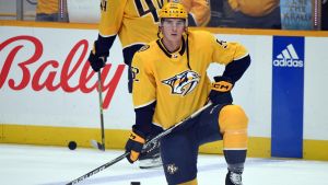 Mar 25, 2023; Nashville, Tennessee, USA; Nashville Predators defenseman Cal Foote (52) stretches before the game against the Seattle Kraken at Bridgestone Arena.