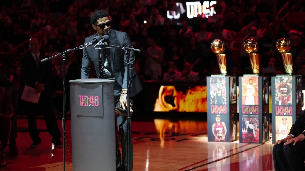 Jan 19, 2024; Miami, Florida, USA; Udonis Haslem speaks after his jersey was lifted to the rafters during the retirement ceremony during halftime of the game between the Miami Heat and the Atlanta Hawks Kaseya Center.