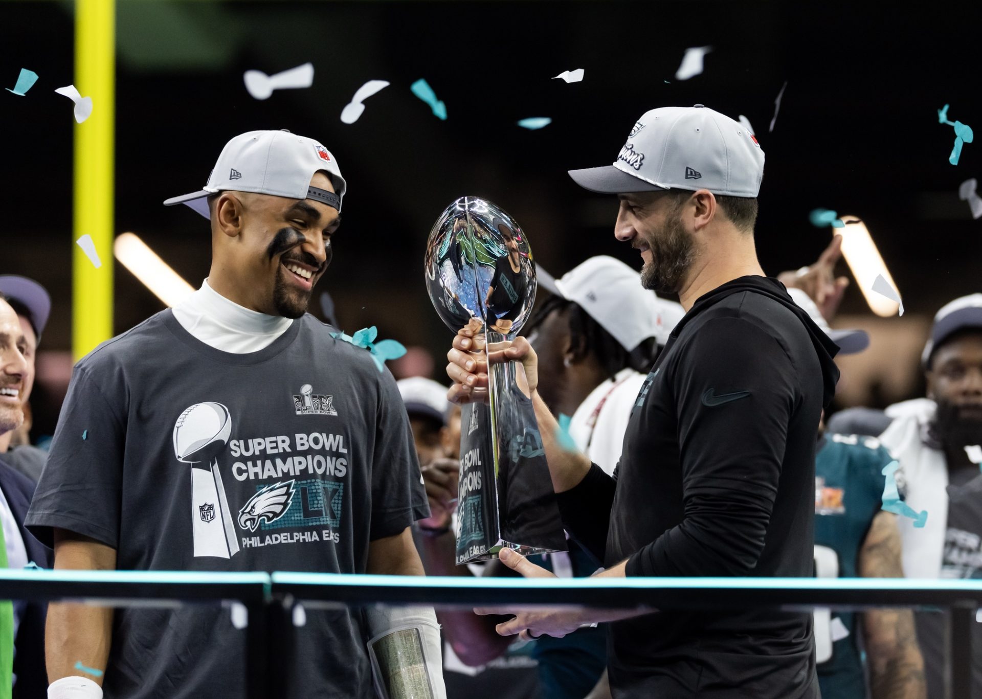Feb 9, 2025; New Orleans, LA, USA; Philadelphia Eagles quarterback Jalen Hurts (left) and head coach Nick Sirianni celebrate with the Vince Lombardi Trophy after defeating the Kansas City Chiefs during Super Bowl LIX at Ceasars Superdome