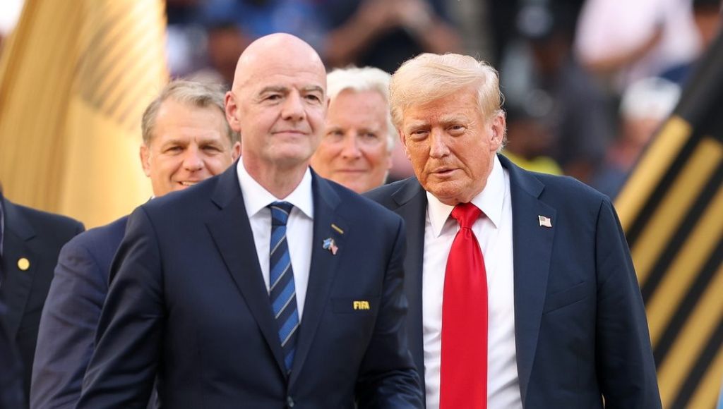Jul 13, 2025; East Rutherford, New Jersey, USA; U.S. President Donald Trump and FIFA president Gianni Infantino on stage during the final of the 2025 FIFA Club World Cup at MetLife Stadium.