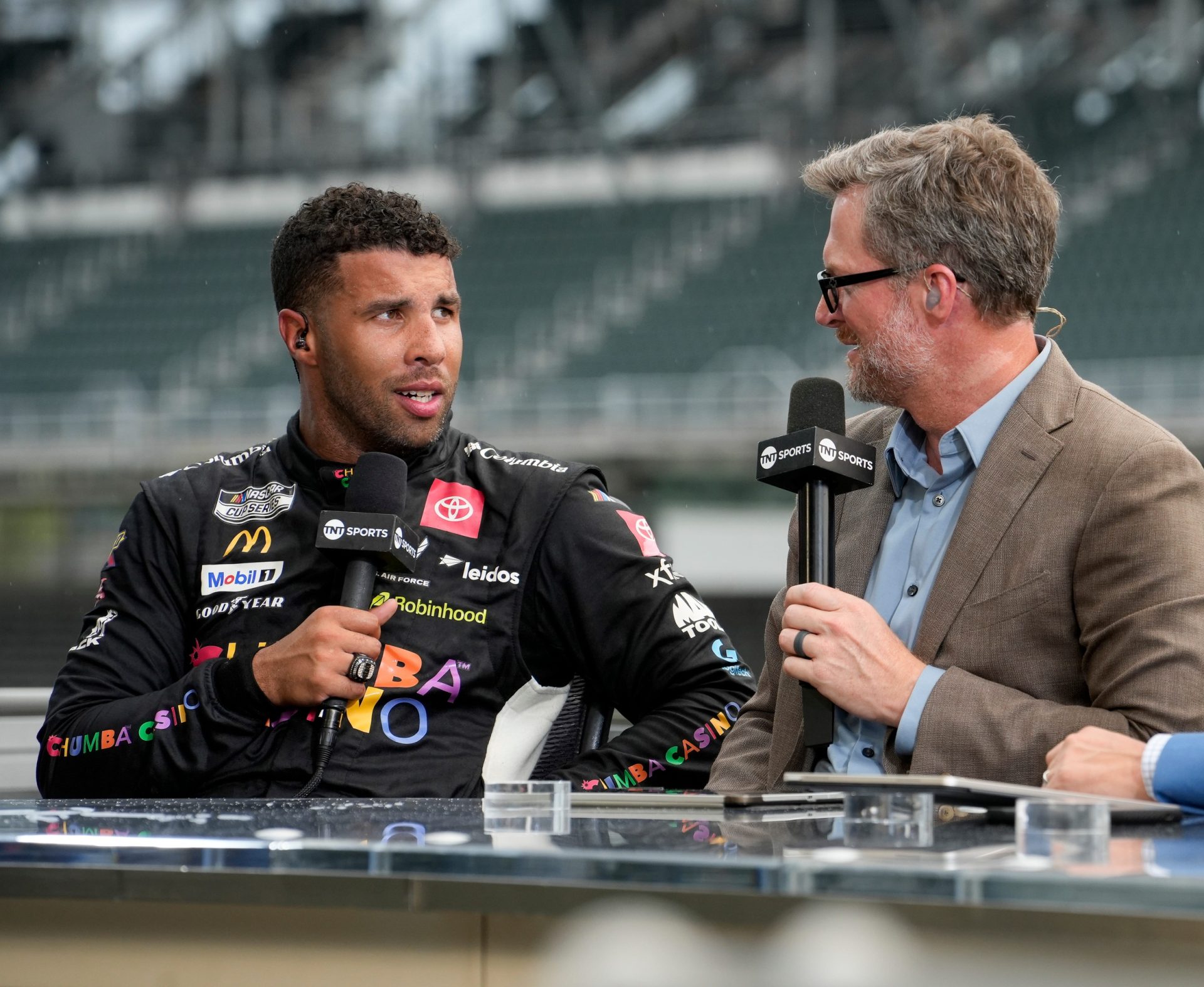 NASCAR Cup Series driver Bubba Wallace (23) speaks with TNT Sports hosts after winning the Brickyard 400 on Sunday, July 27, 2025, at Indianapolis Motor Speedway.
