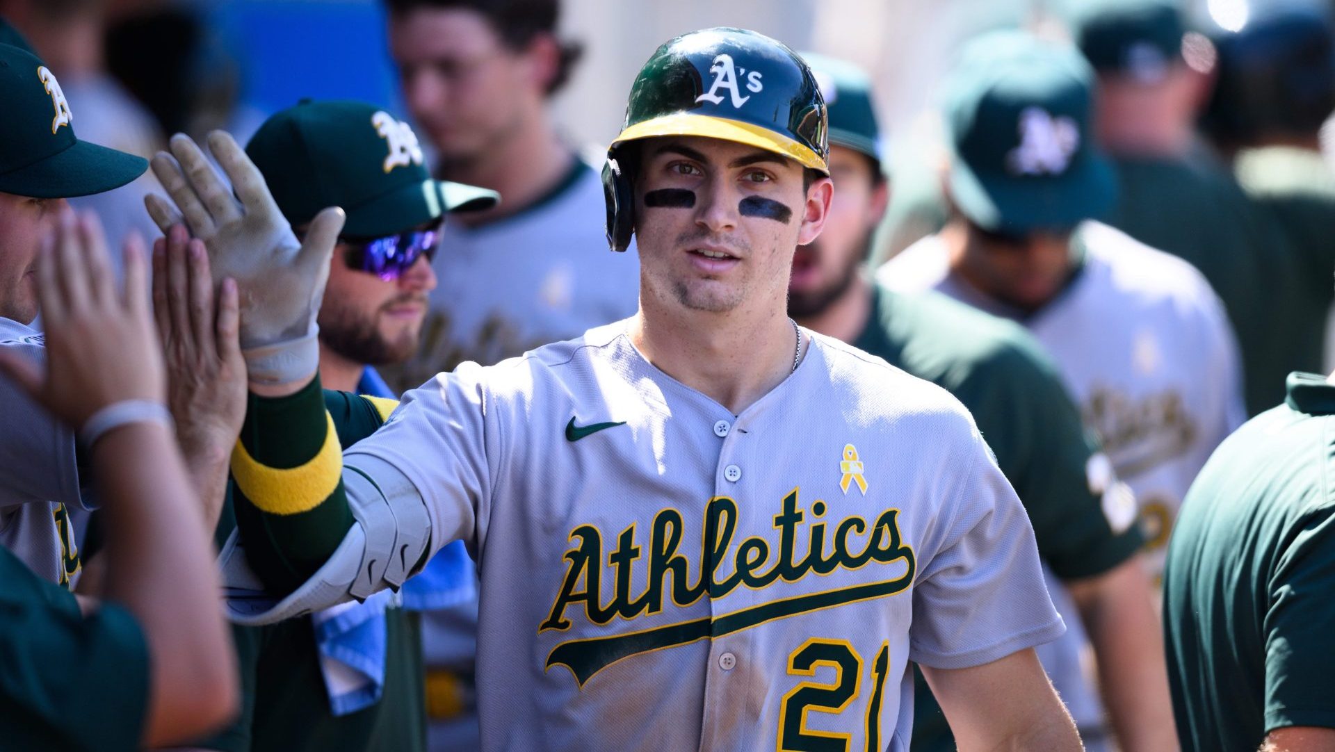 Sep 7, 2025; Anaheim, California, USA; Athletics left fielder Tyler Soderstrom (21) is greeted by teammates after hitting a home run against the Los Angeles Angels during the seventh inning at Angel Stadium.
