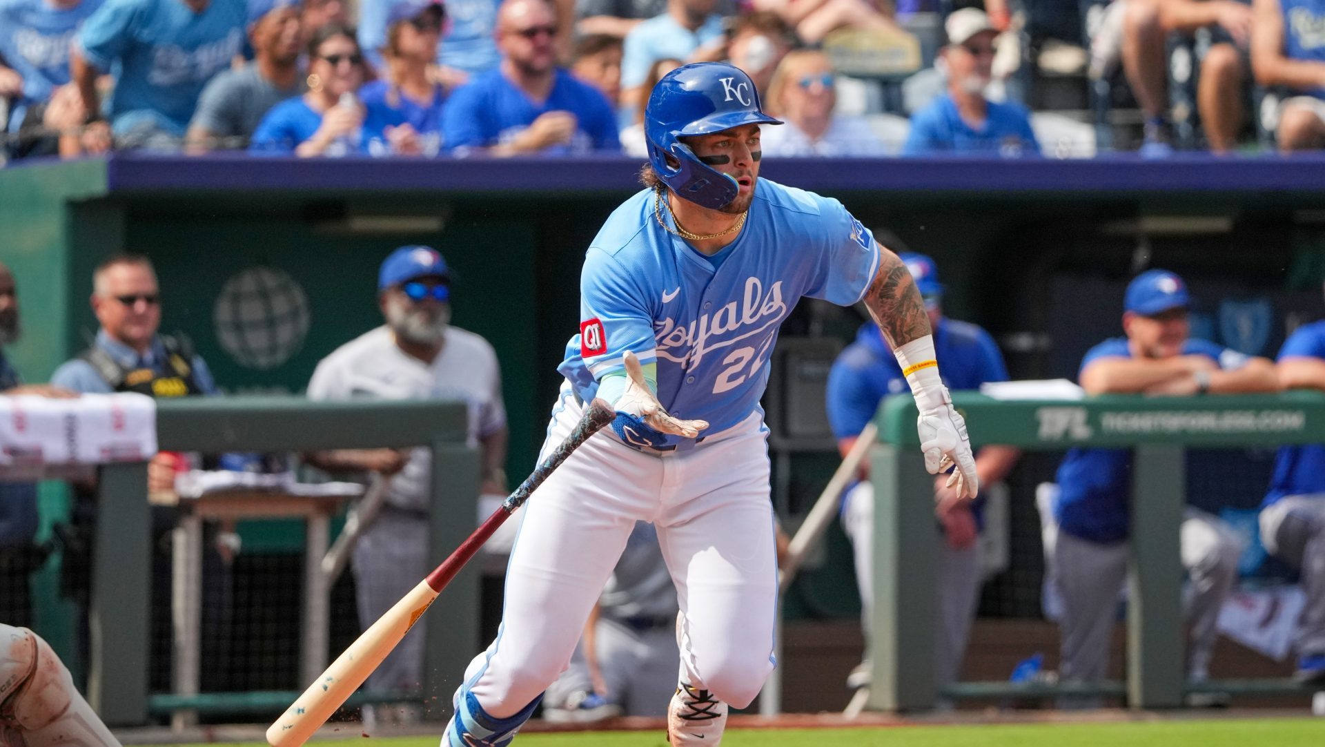 Sep 21, 2025; Kansas City, Missouri, USA; Kansas City Royals catcher Carter Jensen (22) hits a two run single against the Toronto Blue Jays during the fourth inning at Kauffman Stadium.