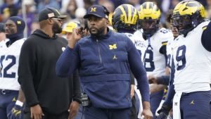 Nov 15, 2025; Chicago, Illinois, USA; Michigan Wolverines head coach Sherrone Moore on the sidelines against the Northwestern Wildcats during the first half at Wrigley Field.
