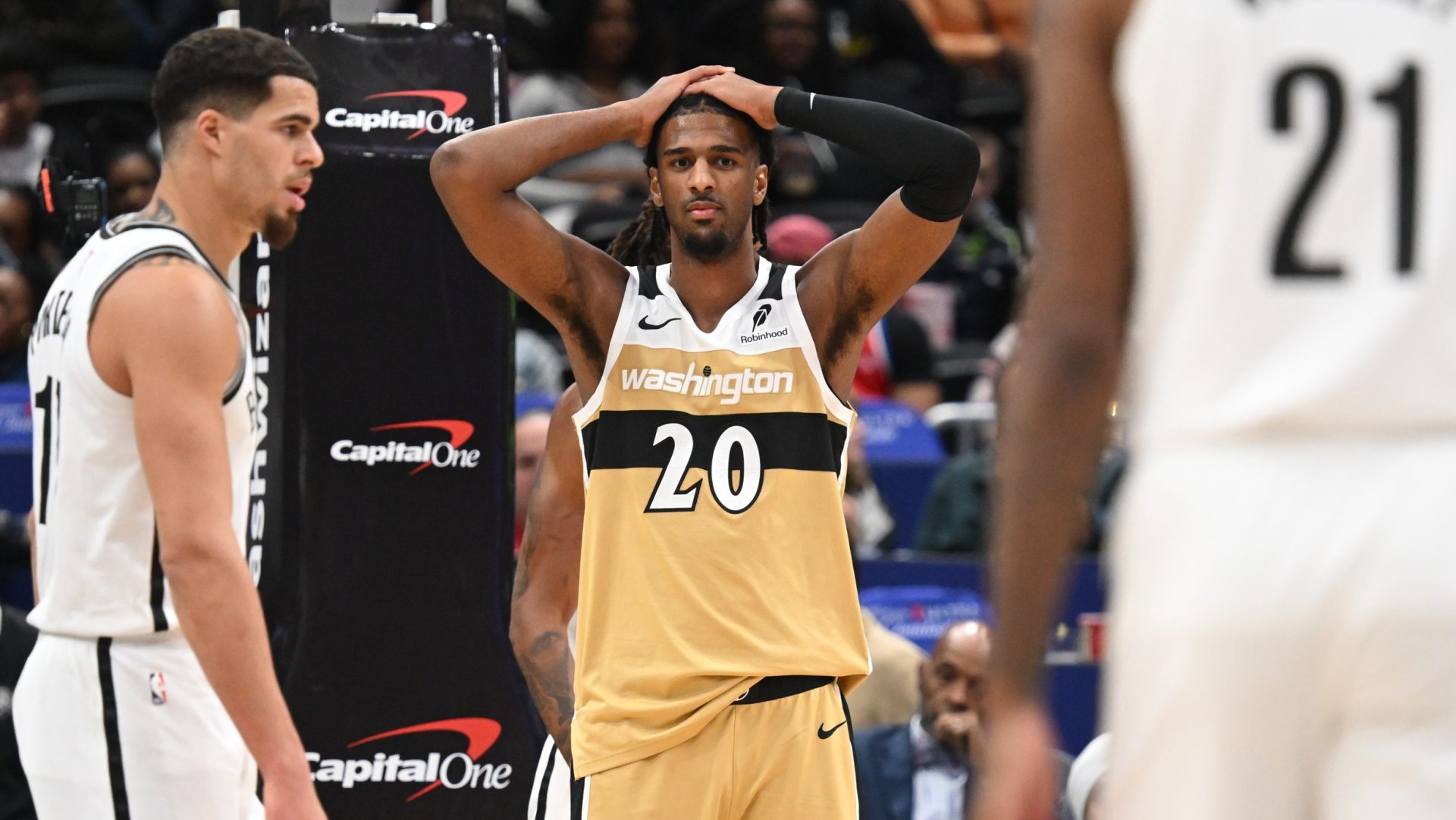 Nov 16, 2025; Washington, District of Columbia, USA; Washington Wizards center Alex Sarr (20) reacts after a foul call against the Brooklyn Nets during the third quarter at Capital One Arena.