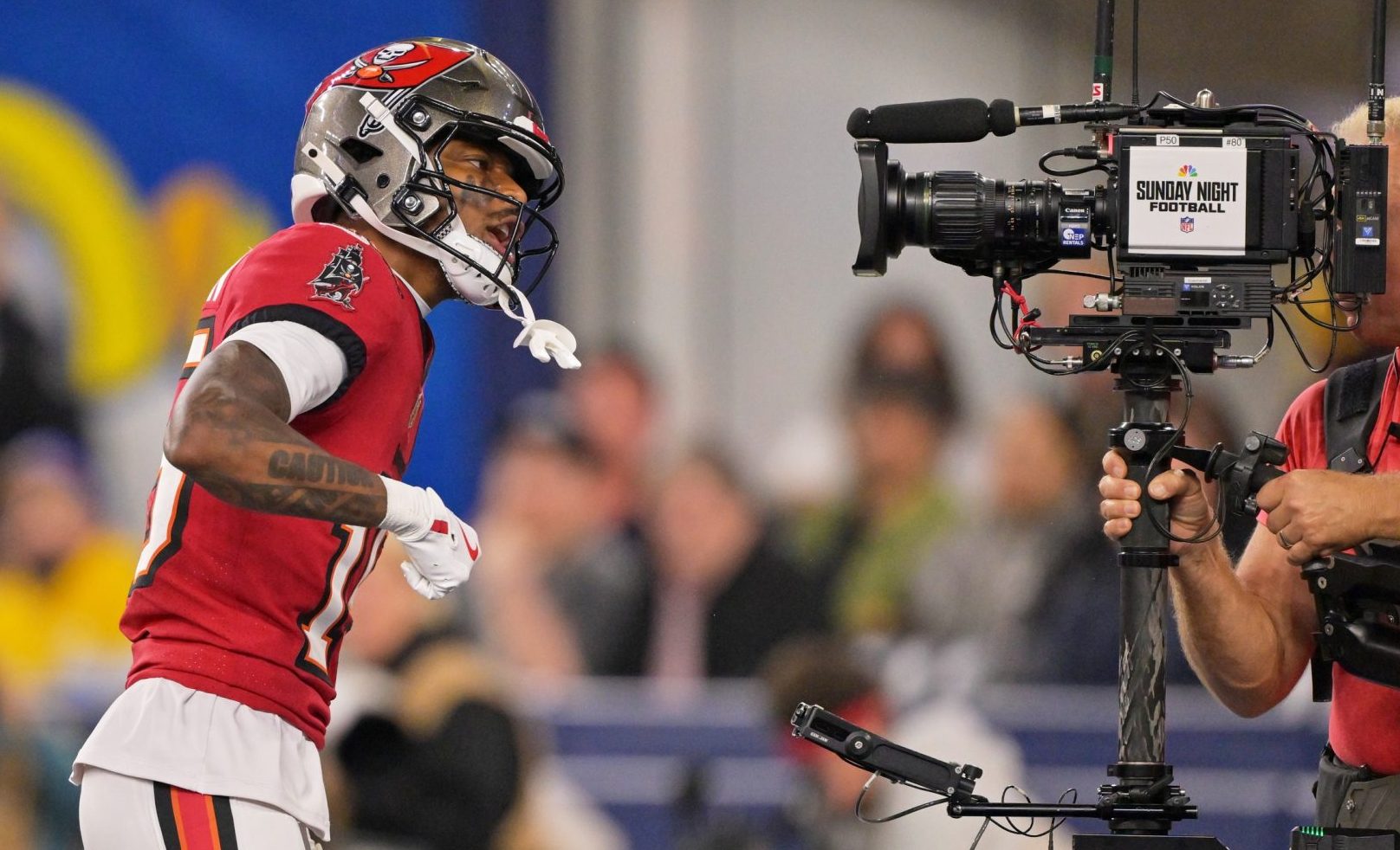 Nov 23, 2025; Inglewood, California, USA; Tampa Bay Buccaneers wide receiver Tez Johnson (15) poses for a television camera after scoring a touchdown against the Los Angeles Rams during the second quarter at SoFi Stadium.