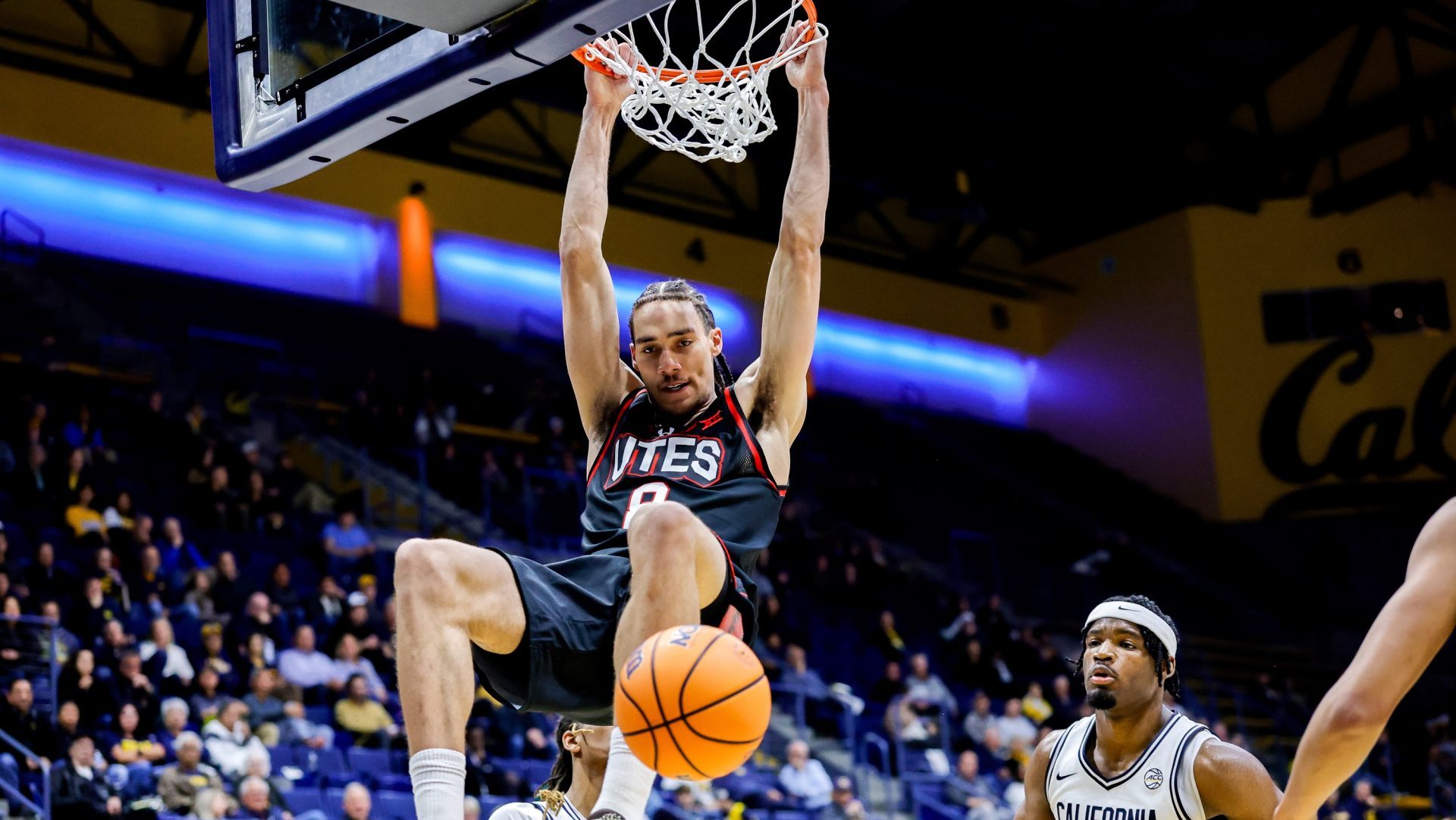 Dec 2, 2025; Berkeley, California, USA; Utah Utes forward Keanu Dawes (8) dunks the ball during the second half against the California Golden Bears at Haas Pavilion.