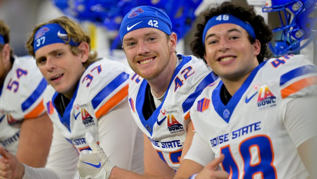 Dec 13, 2025; Inglewood, CA, USA; Boise State Broncos punter Oscar Doyle (37), long snapper Mason Hutton (42) and place kicker Canaan Moore (48) on the bench prior to the LA Bowl Game against the Washington Huskies at SoFi Stadium.