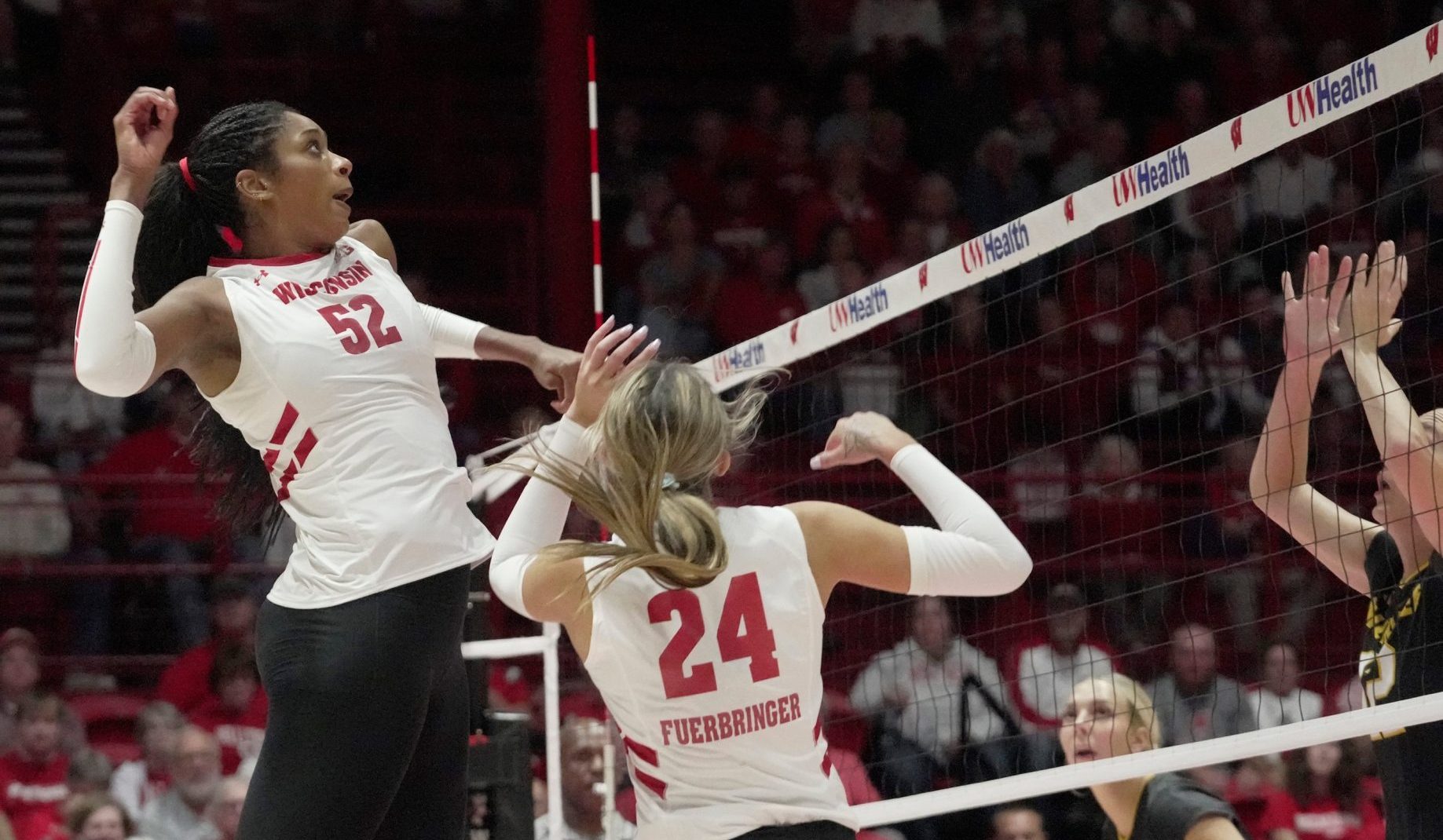 Wisconsin middle blocker Carter Booth (52) is shown during their volleyball match Tuesday, September 9, 2025, at the Wisconsin Field House in Madison, Wisconsin. Wisconsin beat UW-Milwaukee 3-0.