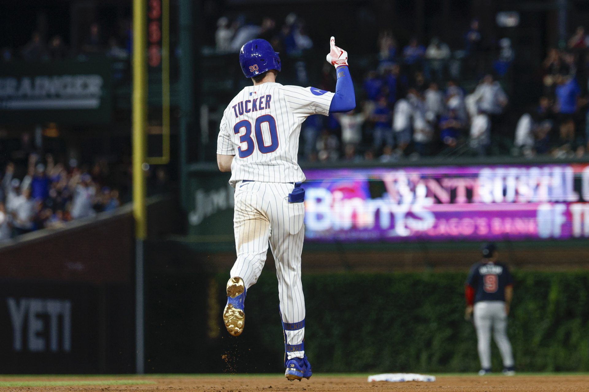 Sep 5, 2025; Chicago, Illinois, USA; Chicago Cubs right fielder Kyle Tucker (30) rounds the bases after hitting a three-run home run against the Atlanta Braves during the third inning at Wrigley Field.