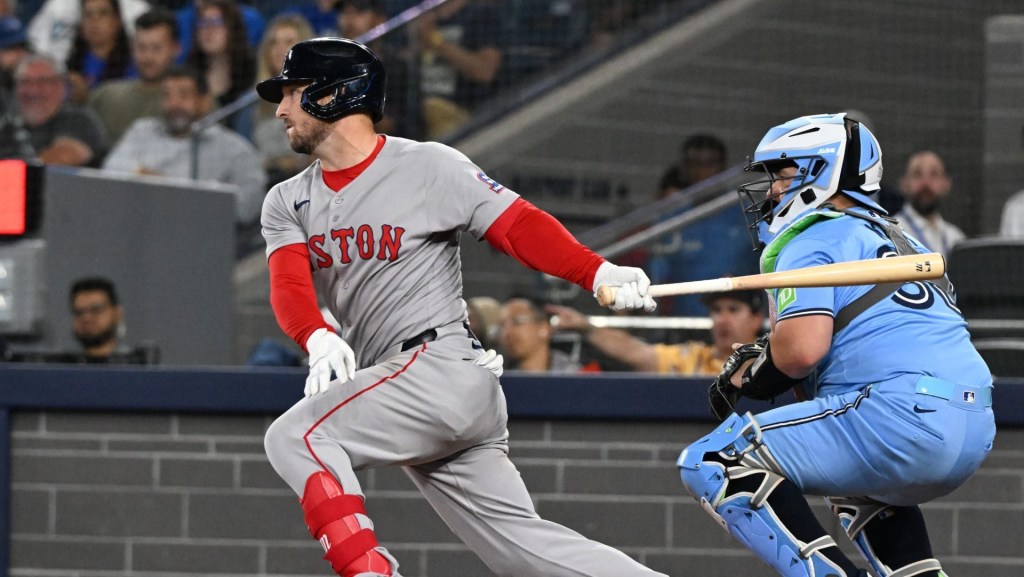 Sep 24, 2025; Toronto, Ontario, CAN; Boston Red Sox third baseman Alex Bregman (2) hits a single against the Toronto Blue Jays in the first inning at Rogers Centre.