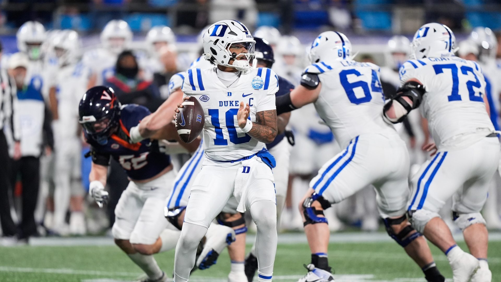 Dec 6, 2025; Charlotte, NC, USA; Duke Blue Devils quarterback Darian Mensah (10) looks to throw in the first quarter against the Virginia Cavaliers during the 2025 ACC Championship game at Bank of America Stadium.