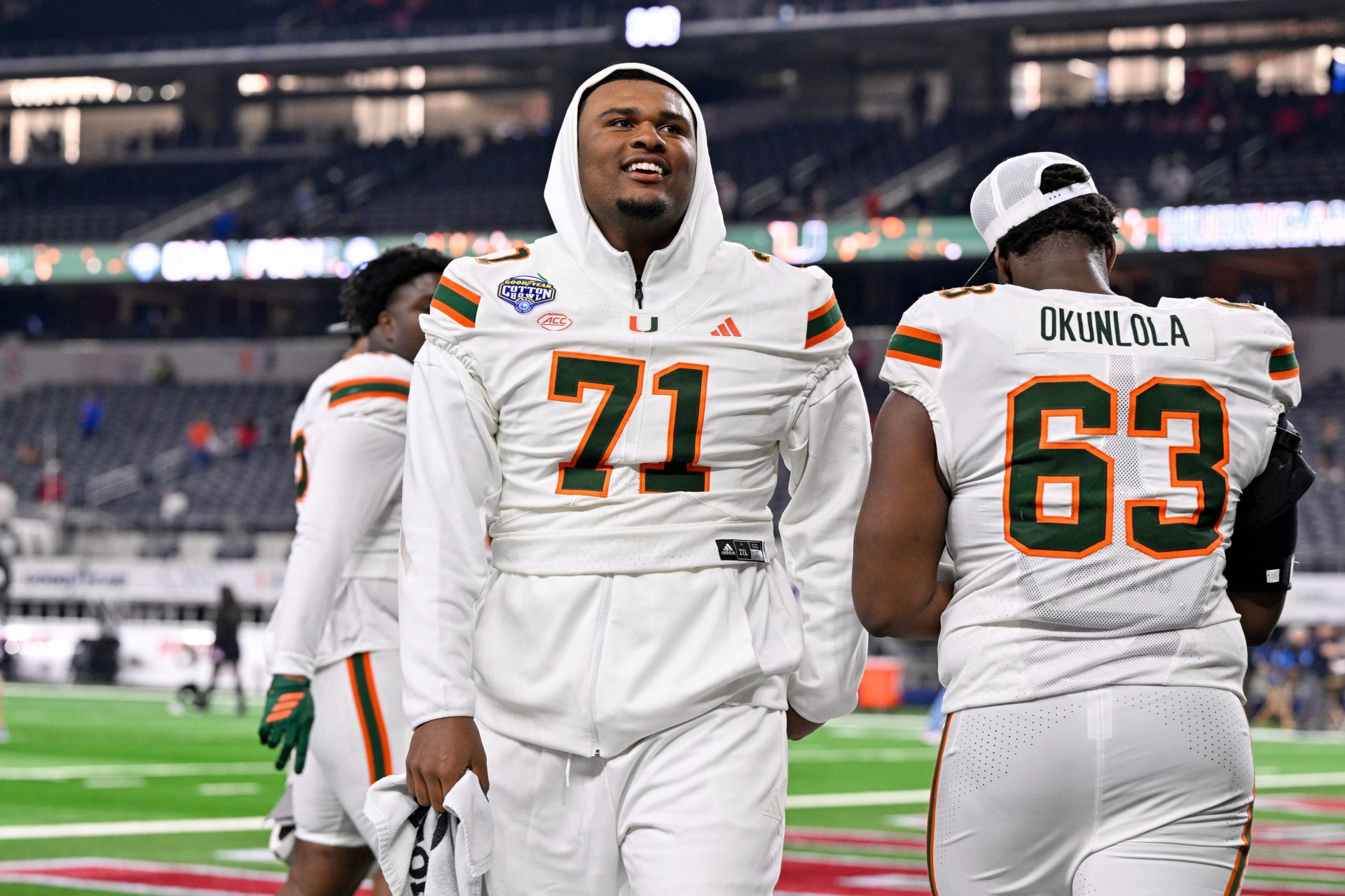 Dec 31, 2025; Arlington, TX, USA; Miami Hurricanes offensive lineman Jaden Wilkerson (71) walks off the field after the 2025 Cotton Bowl and quarterfinal game of the College Football Playoff at AT&T Stadium.