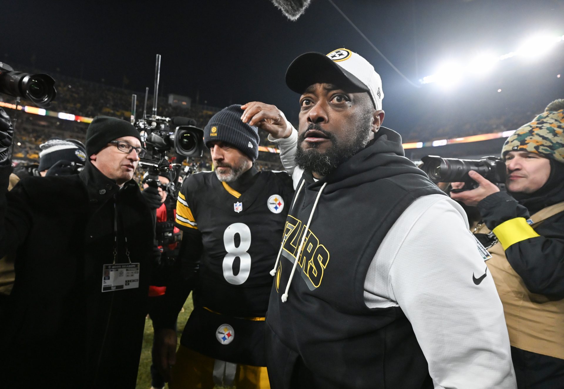 Jan 4, 2026; Pittsburgh, Pennsylvania, USA; Pittsburgh Steelers head coach Mike Tomlin and quarterback Aaron Rodgers (8) celebrate after defeating the Baltimore Ravens at Acrisure Stadium.