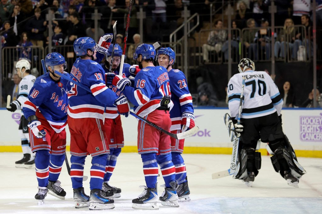 Jan 5, 2026; New York, New York, USA; New York Rangers center Vincent Trocheck (16) celebrates his goal against Utah Mammoth goaltender Karel Vejmelka (70) with left wings Artemi Panarin (10) and Alexis Lafreniere (13) and center Mika Zibanejad (93) and defenseman Adam Fox (23) during the second period at Madison Square Garden.