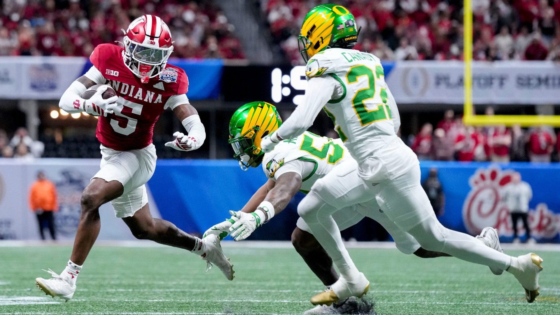Indiana Hoosiers defensive back D'Angelo Ponds (5) rushes the ball Friday, Jan. 9, 2026, during the Peach Bowl and semifinal game of the College Football Playoff against the Oregon Ducks at Mercedes-Benz Stadium in Atlanta.