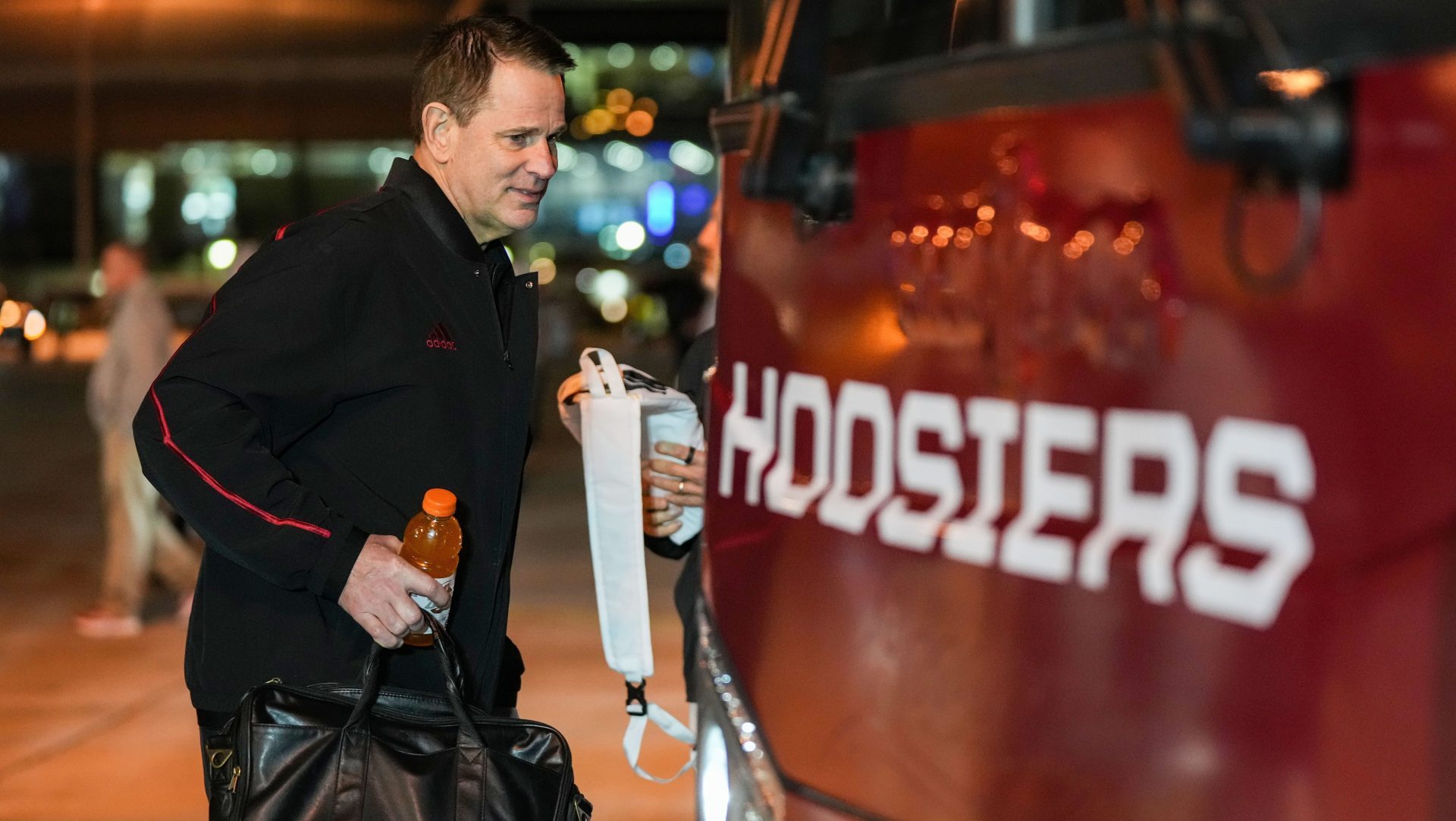 Indiana Hoosiers head coach Curt Cignetti walks on to the bus Friday, Jan. 16, 2026, at the Miami Airport in Miami.